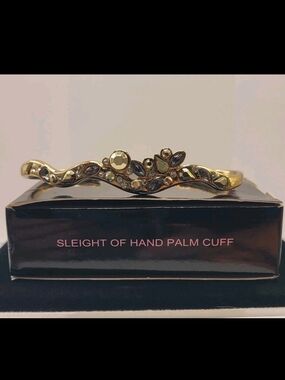 Avon Gold-Tone Slieght Of Hand Palm Cuff Bracelet with Crystal Accents